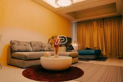 a living room with a couch and a table at Lux Studio Plaza Damas Kuala Lumpur KL in Kuala Lumpur
