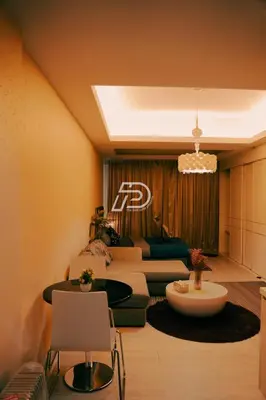 a living room with a couch and a table at Lux Studio Plaza Damas Kuala Lumpur KL in Kuala Lumpur