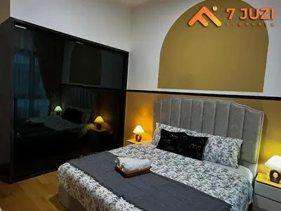 a bedroom with a large bed with a head board at KLCC 23A Premium 1B1R with Best View Infinity Pool and Netflix 1080HD in Kuala Lumpur