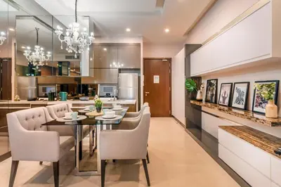 a kitchen and dining room with a table and chairs at Dorsett Bukit Bintang near Pavilion KL, Kuala Lumpur in Kuala Lumpur