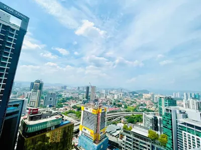 a view of a city with tall buildings at KLCC Service Suites at Mews in Kuala Lumpur