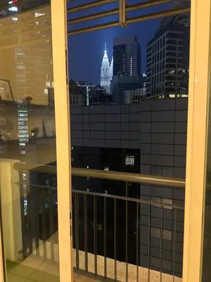 a view of a city skyline from a window at Bukit bintang central seri Bukit Ceylon in Kuala Lumpur