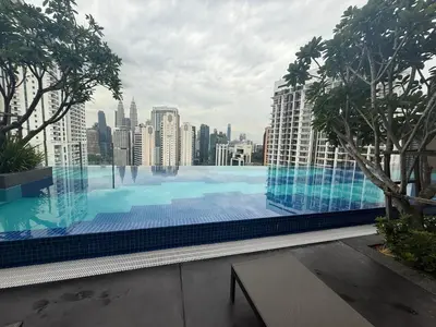 a large swimming pool on the roof of a building at Majestic Residence KLCC Sky view in Kuala Lumpur