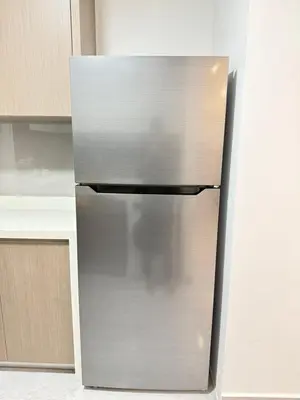 a stainless steel refrigerator in a kitchen at Majestic Residence KLCC Sky view in Kuala Lumpur
