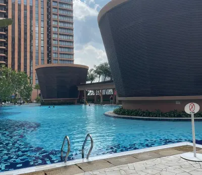 a large swimming pool in a city with tall buildings at City view Apartment at Times square in Kuala Lumpur