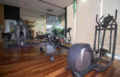 a gym with several exercise bikes in a room at Casa Residency Apartment Bukit Bintang by Cupid home in Kuala Lumpur