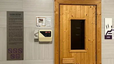 a wall with a pay phone on a wall at Balcony Cityscape V The Robertson Residence 36f in Kuala Lumpur