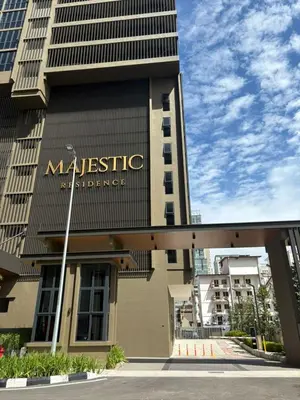 a large building with a sign on the side of it at Ubays Majestic House in Kuala Lumpur