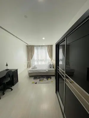 a bedroom with a bed and a desk and a window at KLCC Bukit Bintang Binjai 8 premium soho by Prime Suites in Kuala Lumpur