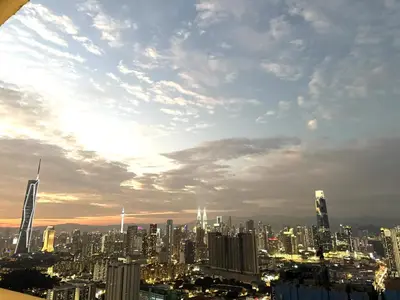 a view of a city skyline with a cloudy sky at Trion Residence Kuala Lumpur By A&B in Kuala Lumpur