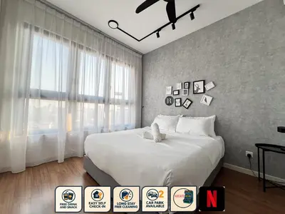 a bedroom with a large white bed and a window at M Vertica Residences by The Clover, Maluri , Cheras , Kuala Lumpur , KLCC, Free Parking in Kuala Lumpur