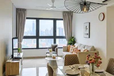 a living room with a couch and a table at M Vertica Residences by The Clover, Maluri , Cheras , Kuala Lumpur , KLCC, Free Parking in Kuala Lumpur