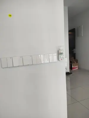 a kitchen with a white counter top in a room at The Valley, SkySierra KL in Kuala Lumpur