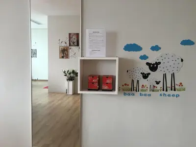 a room with a wall with a sticker of a sheep at Soho Suites @ KLCC by Luxury Suites Asia in Kuala Lumpur