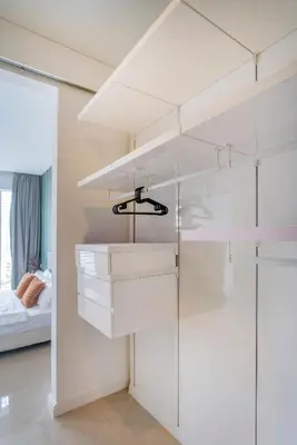 a room with white shelves and a bed at Platinum near KLCC Kuala Lumpur in Kuala Lumpur