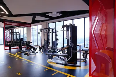 a gym with several treadmills and tread machines at Majestic Residence KLCC By AMG in Kuala Lumpur