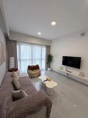 a living room with two couches and a flat screen tv at Agile bukit bintang TRX by KLCC in Kuala Lumpur