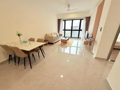 a living room with a table and a couch at Agile Bukit Bintang By AR in Kuala Lumpur