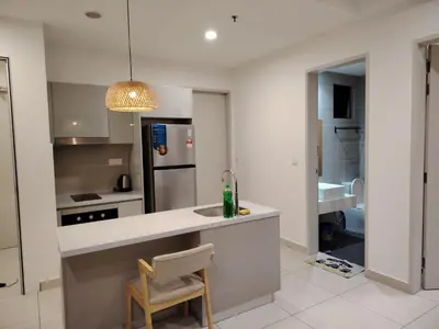 a kitchen with a white counter and a sink at Trion Residence Kuala Lumpur by Centrix in Kuala Lumpur