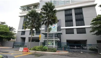 a white building with palm trees in front of it at 013A2 Casa Residency- Sweet Home 2R 2B in Kuala Lumpur
