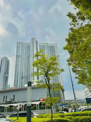 a building with tall buildings in the background at Sky Line Agile Suites KL in Kuala Lumpur