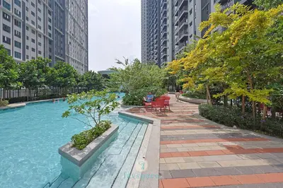 a swimming pool in a city with tall buildings at 15min to Mid Valley - M Arisa Sentul KL for 5 in Kuala Lumpur