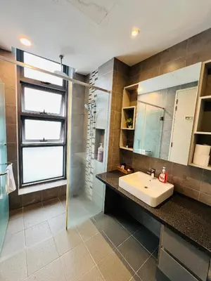 a bathroom with a sink and a shower at FA Suits KL BY ROBERTSON in Kuala Lumpur