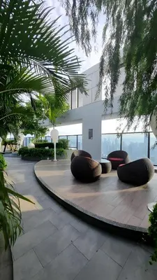 a lobby with a circular seating area in a building at Trion Hotel by HAVENZA near TRX, Time Square and Bukit Bintang in Kuala Lumpur