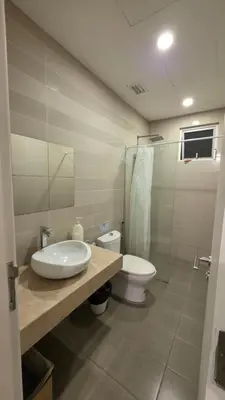 a bathroom with a sink and a toilet and a shower at Binjai 8 KLCC Premium Soho By Prime Suites in Kuala Lumpur