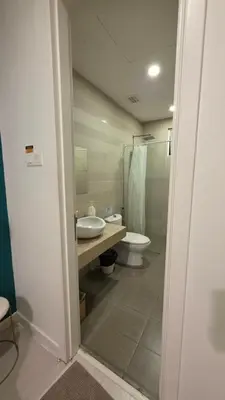 a bathroom with a sink and a toilet at Binjai 8 KLCC Premium Soho By Prime Suites in Kuala Lumpur