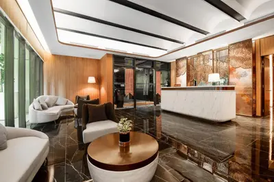 a living room with a couch and a table at Imperial KLCC by WSD in Kuala Lumpur