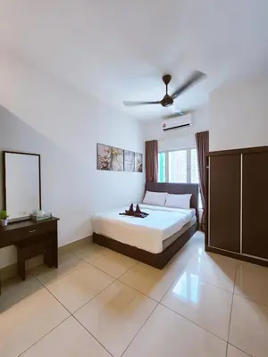 a bedroom with a bed and a ceiling fan at RC Residence 6 pax by Define Suite in Kuala Lumpur