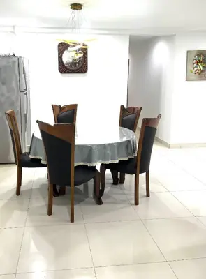 a dining room with a table and chairs at Apartment in bukit bintang in Kuala Lumpur