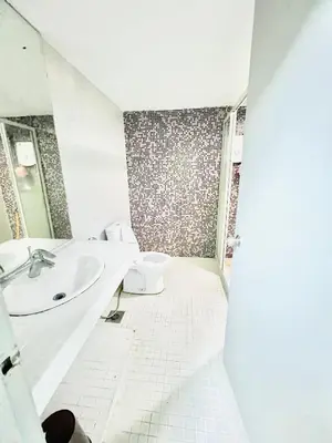 a bathroom with a sink and a toilet at Apartment in bukit bintang in Kuala Lumpur