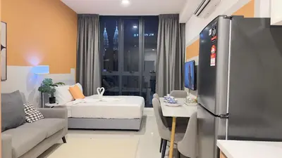 a small room with a bed and a couch at Luxury couple suite 307A at Majestic Residence in Kuala Lumpur