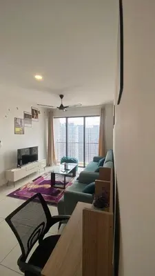 a living room with a couch and a table at COZY Kenwingston The platz Setapak 3BR&2BR 5-8PAX FREE WIFI PARKIN NETFLIX 3306 in Kuala Lumpur