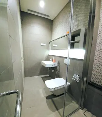 a bathroom with a toilet and a sink at Lucentia Residence Infinity swimming pool BY Lalaport in Kuala Lumpur