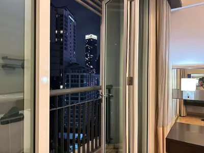 a balcony with a view of a city skyline at Seri Bukit Ceylon Bukit Bintang Kuala Lumpur City Centre in Kuala Lumpur