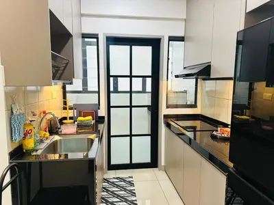 a kitchen with a sink and a counter top at Sentul Home Condo-KLCC View with 3bed,3bath, cooking allowed in Kuala Lumpur