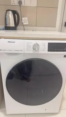 a white microwave oven with a kettle on top of it at Luxury studio suite 277A at KLCC in Kuala Lumpur