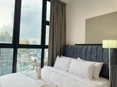 a hotel room with a bed and a large window at Luxury private family suite 26161BR at KLCC in Kuala Lumpur