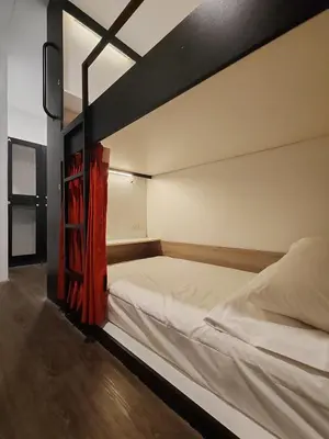 a bunk bed in a room with at Traveller Ark Hotel and Bunks in Kuala Lumpur