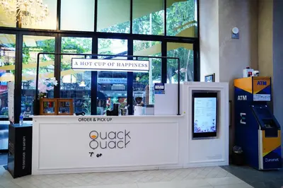 a kiosk in a building with a sign on it at Scarletz Suites By Home Stay in Kuala Lumpur