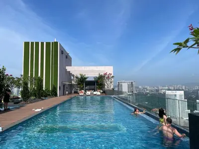 a swimming pool on the roof of a building at The Riv Riveria City KL Sentral Kuala Lumpur by Nestaway in Kuala Lumpur