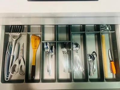 a bunch of utensils are arranged in a drawer at Mercu summer suites klcc luxury couple 1BR apartment with balcony, pool view free Netflix in Kuala Lumpur