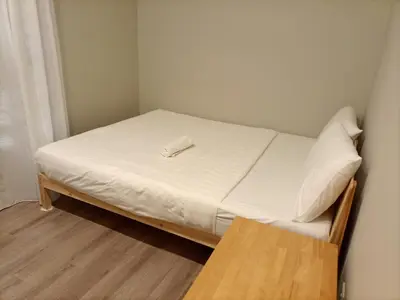 a small bed in a small room with a white mattress at Service Apartment Agile Residence KL in Kuala Lumpur