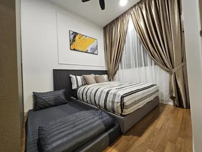 a small bedroom with a bed and a window at Cozy Velocity Residence2 Linked to Mall 6pax Wifi 600mbps in Kuala Lumpur