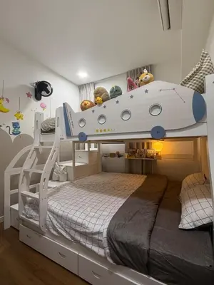 a bedroom with a bunk bed with a ship on it at M Vertica w Infinity Pool Mrt TRX Sunway Velocity in Kuala Lumpur