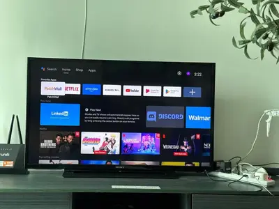 a flat screen tv sitting on top of a table at Casa Residency in Kuala Lumpur