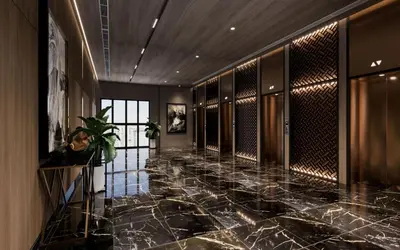 a lobby with a marble floor and a hallway with cabinets at Majestic Residence KLCC in Kuala Lumpur